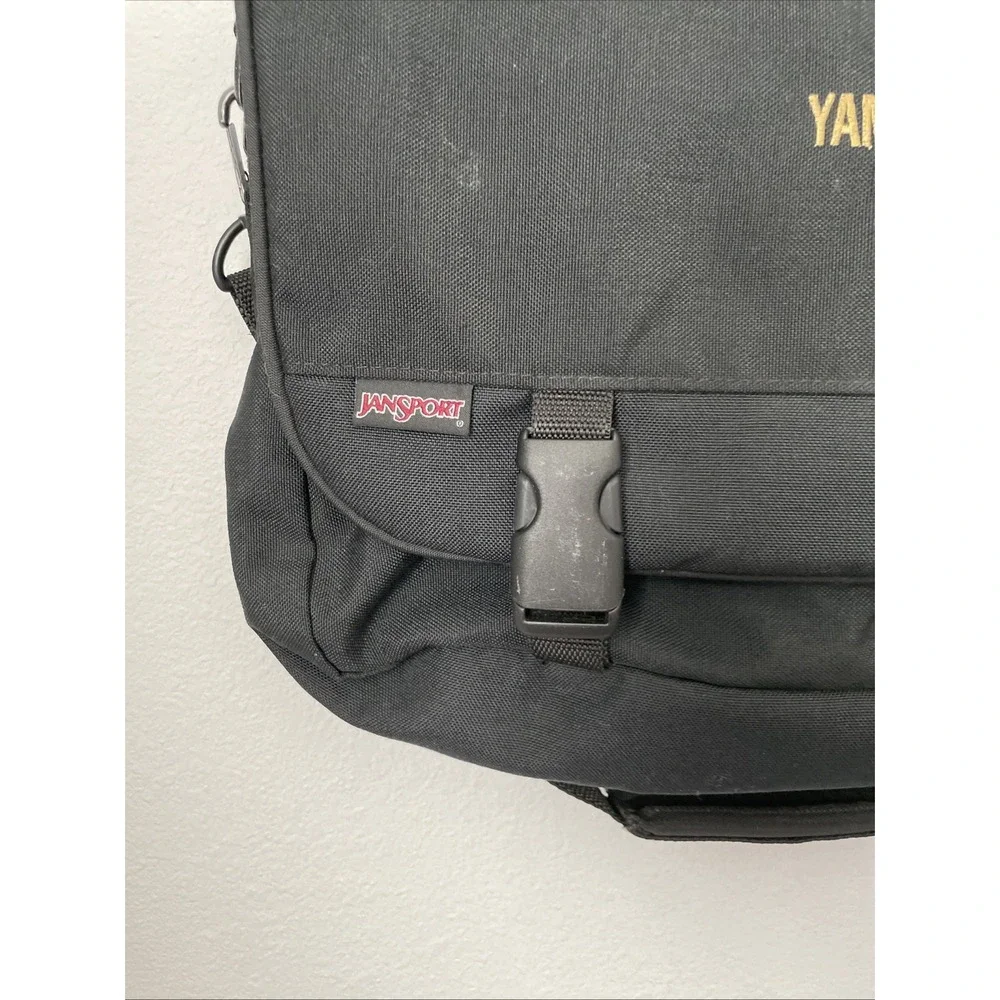 JanSport Mens Black Messenger Bag Yamaha Embroidered Suede Trim Laptop Bag